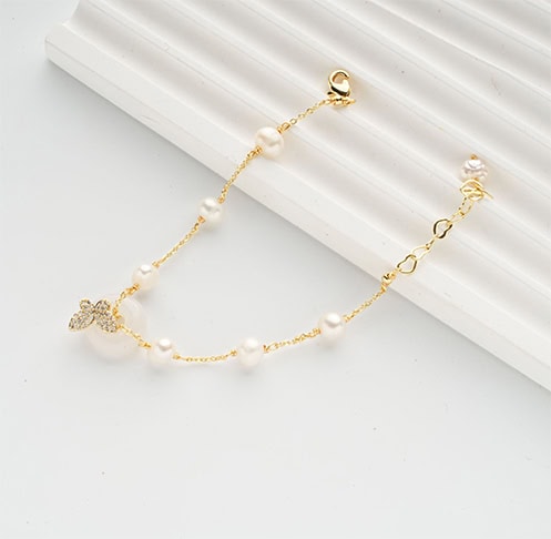 Freshwater Pearl Bracelet with Micro-Zircon Butterfly Charm Freshwater Pearl Bracelet with Micro-Zircon Butterfly Charm