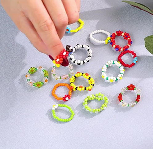 Handmade colorful woven daisy ring Handmade colorful woven daisy ring