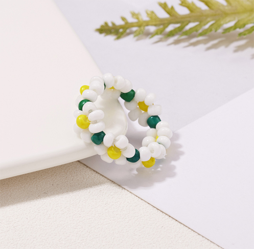 Handmade colorful woven daisy ring Handmade colorful woven daisy ring