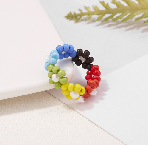 Handmade colorful woven daisy ring Handmade colorful woven daisy ring