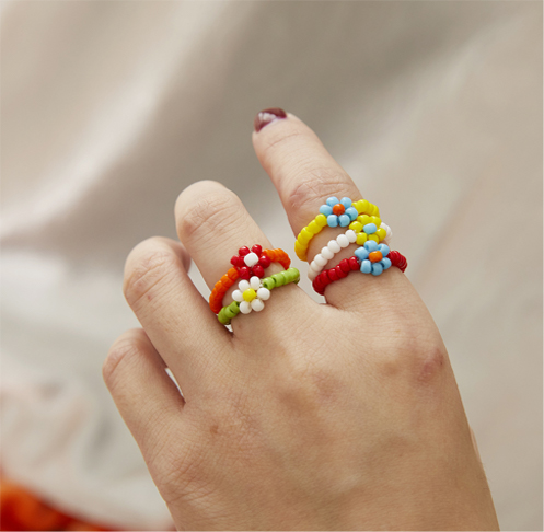 Handmade colorful woven daisy ring Handmade colorful woven daisy ring